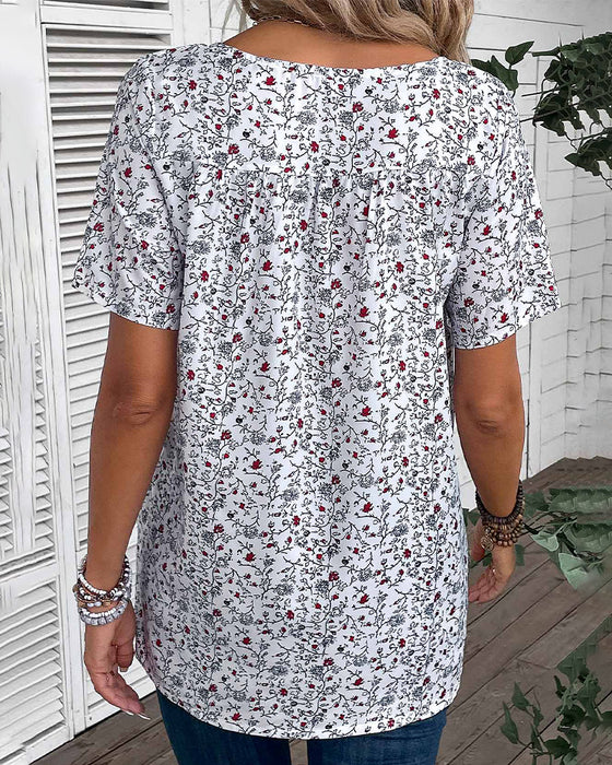 Volang blus med blommönster