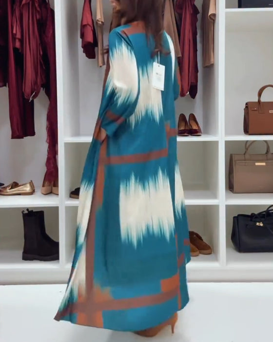 Modig Tryckt Klänning Med Runt Halsutsnitt Och Långa Ärmar