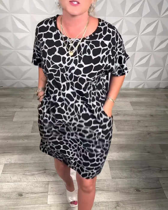 Klänning avslappnad med tryck och rund halsringning