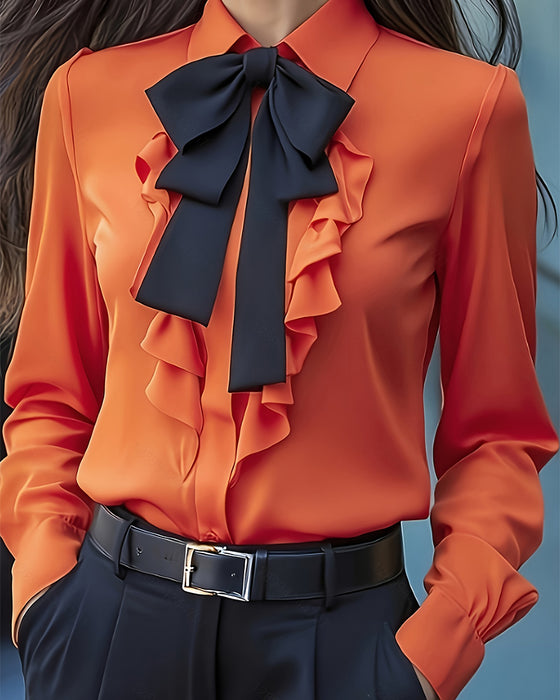 Långärmad Blus Med Rosett Och Volanger