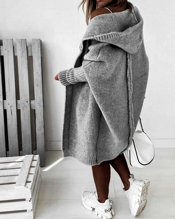 Enkel kofta med fladdermushuva i enfärgad färg