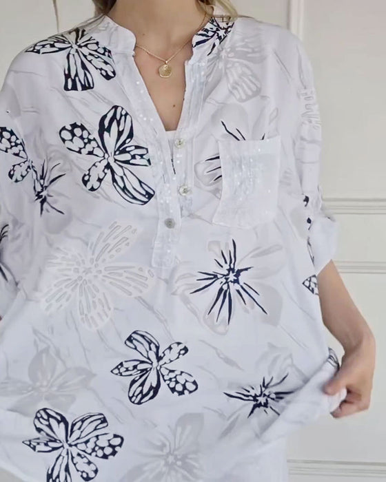 Blus Blomsterknappning V-hals