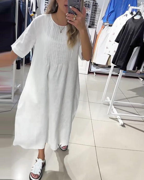 Casual lös klänning med enfärgad och halvärm