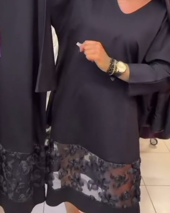 Stilfull Klänning Med Rosett På Ryggen Och V-Ringning