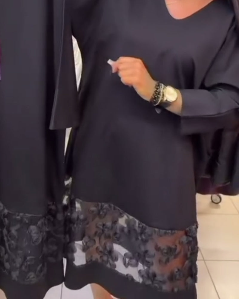 Stilfull Klänning Med Rosett På Ryggen Och V-Ringning