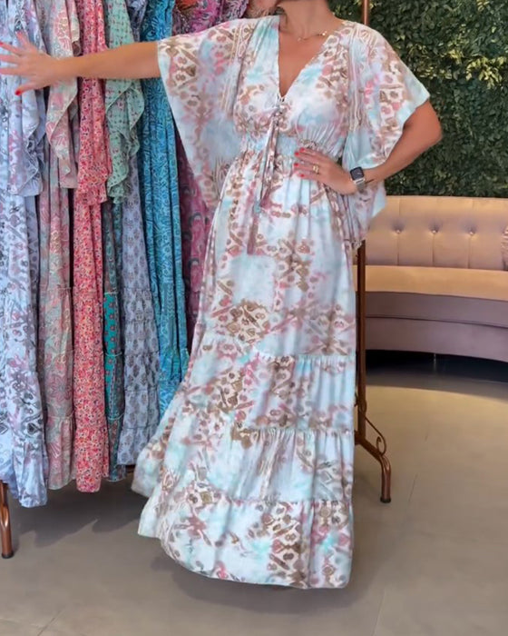 V-ringad lång klänning med fjärilsärm med tryck