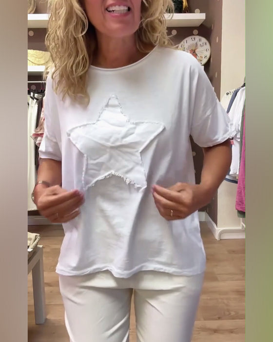 T-shirt med avslappnad lös halsringning