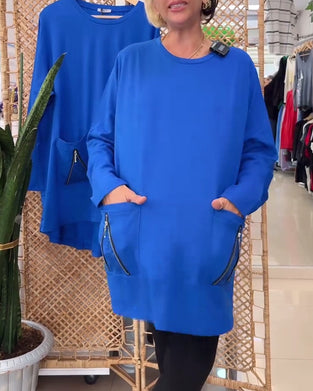 Enfärgad dragkedja i enfärgad tröja med rund hals