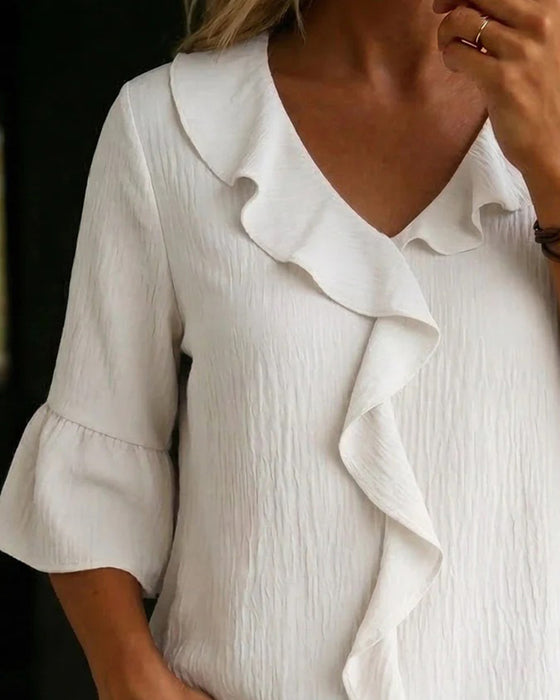 Blus Texturerad Volang Klockärm