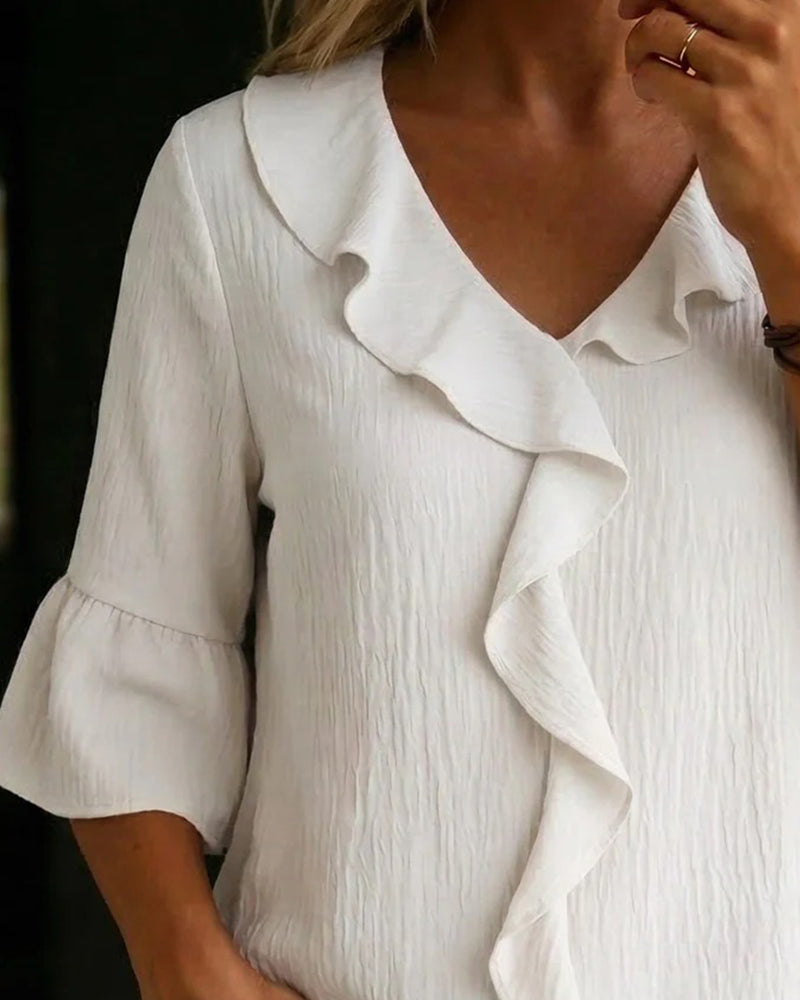 Blus Texturerad Volang Klockärm