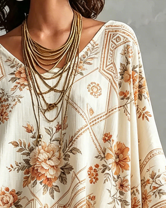 Blus V-Hals Blommig Oregelbunden
