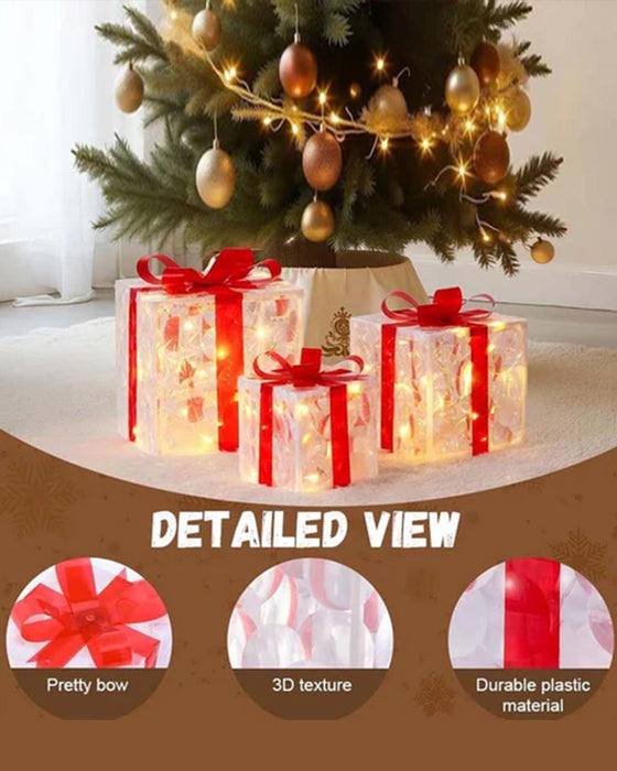 Juldekorationer I Form Av Glödande Presentlådor