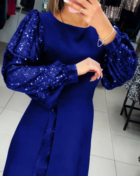 Elegant Klänning Med Puffärmar Och Lapptäcktsdetaljer