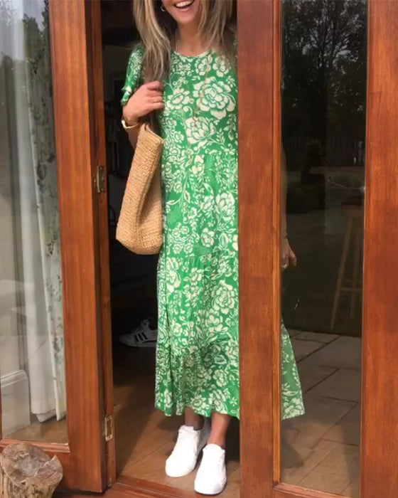 Kortärmad långklänning med blommönster