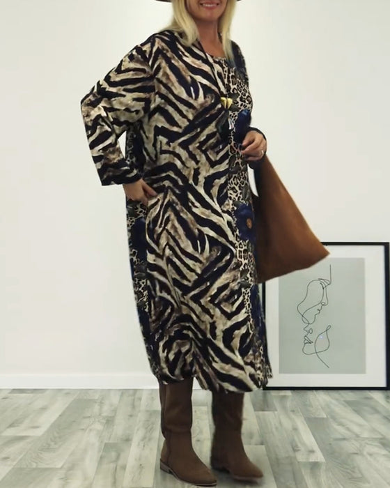 Snygg zebramönstrad leopardmönstrad patchworkklänning