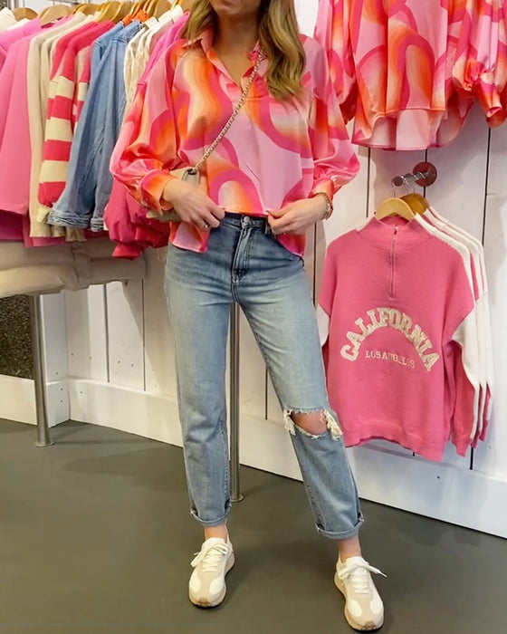 Blus med kavajslag och lång ärm