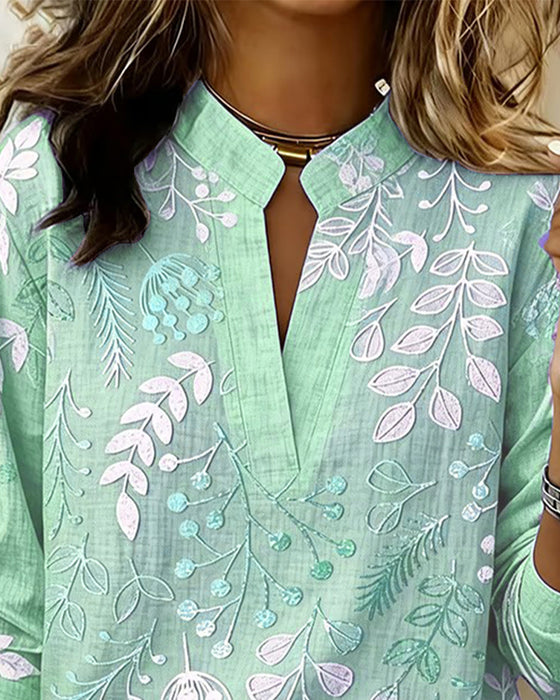 Blus Med Blommigt Mönster Och Ståkrage