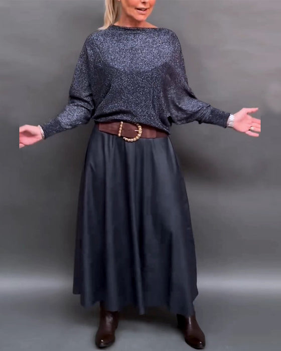 Glänsande topp med rund hals och dolmanärm