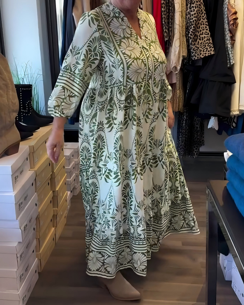 Klänning Med Blommönster Och V-Ringning