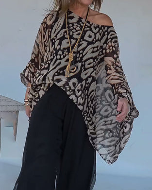 Oregelbunden Blus Med Fladdermusmönster Och Lång Ärm