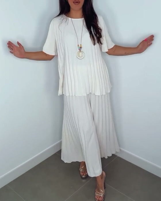 Enfärgade plisserade lösa set