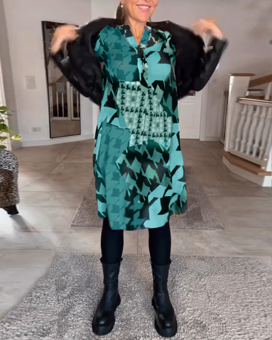 Klänning med v-ringning och långa ärmar