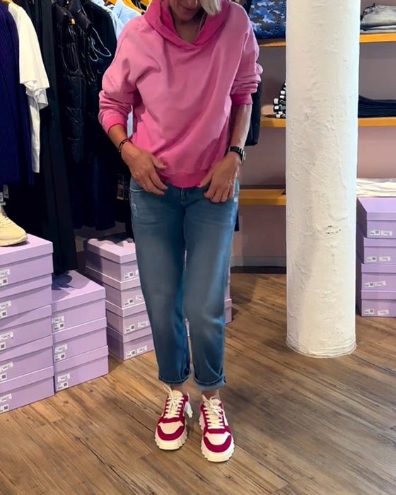 Avslappnad luvtröja med lutning