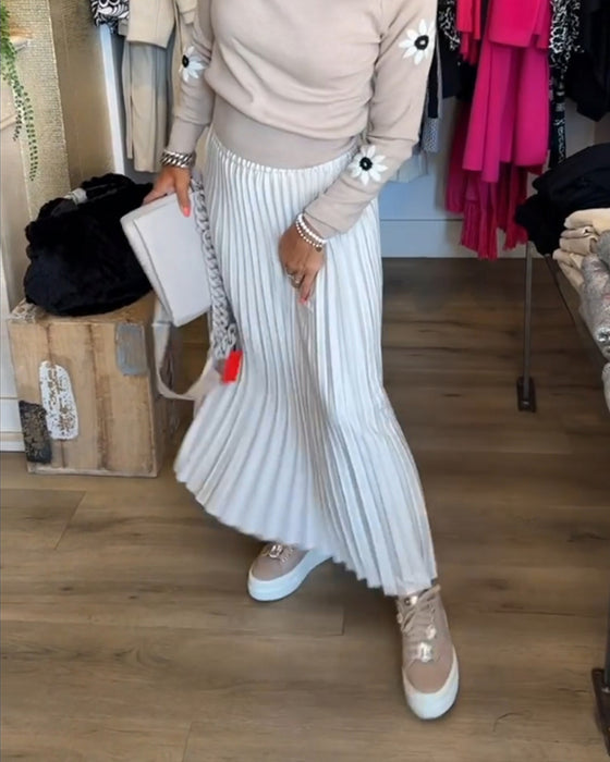 Plisserad enfärgad klänning