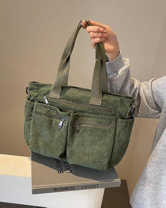 Enfärgad manchesterväska