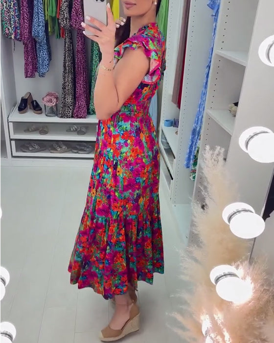 Färgglad blommig V-ringad elegant klänning