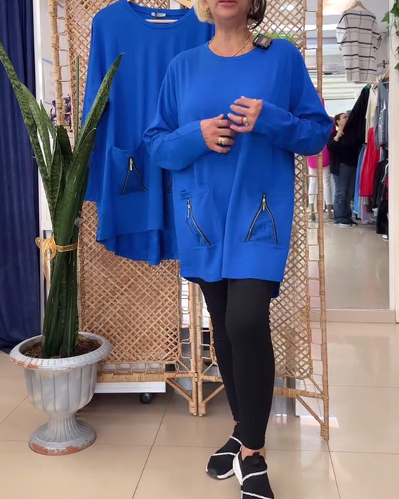 Enfärgad dragkedja i enfärgad tröja med rund hals