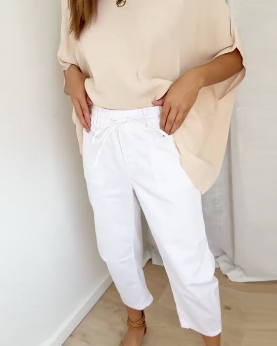 Byxor I Denim Med Fickor Och Kort Längd