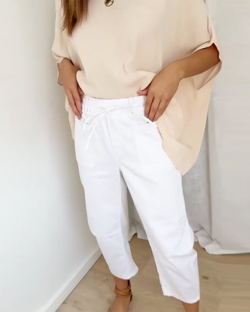 Byxor I Denim Med Fickor Och Kort Längd