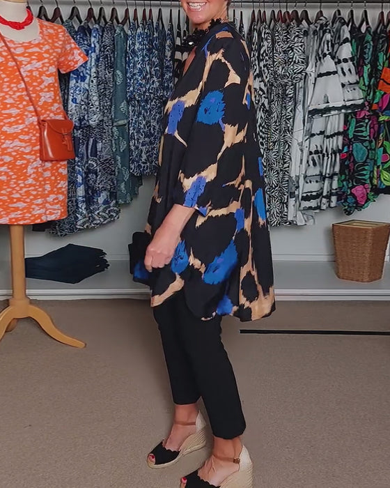 V-ringad avslappnad långärmad blus i kontrastfärg