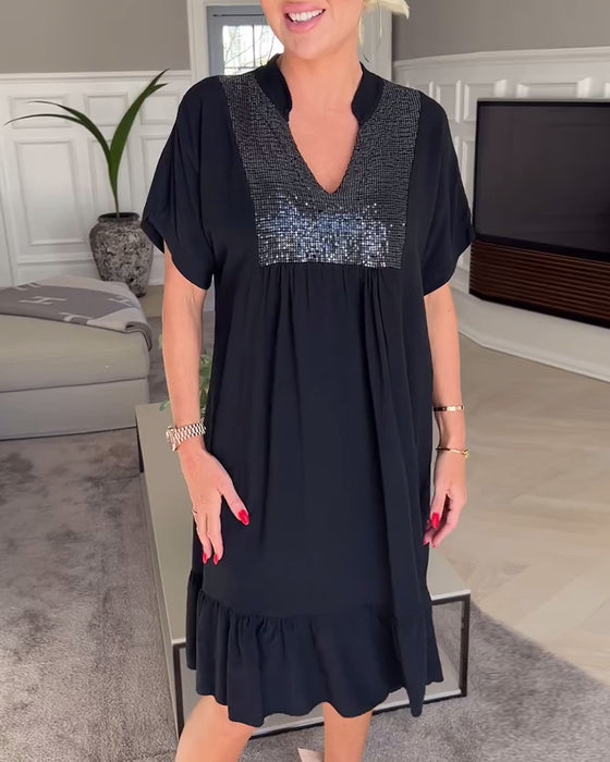 V-ringad lös veckad klänning