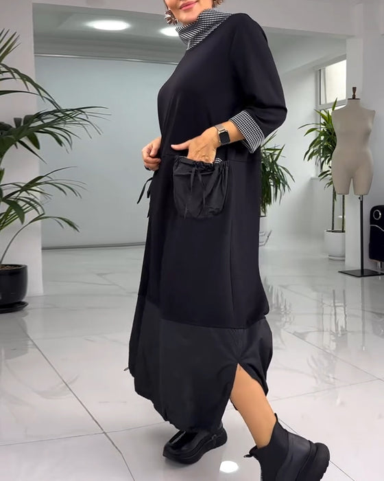 Avslappnad rutig lappklänning med hög krage