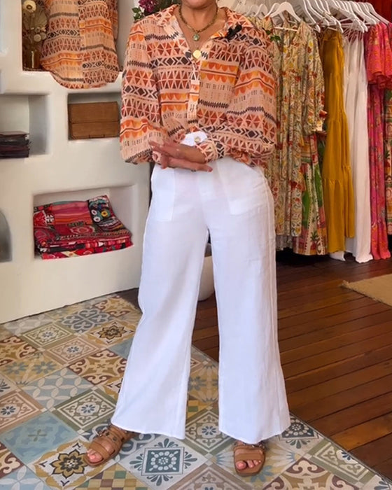 Skjorta med slag och retrotryck