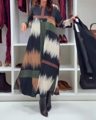 Modig Tryckt Klänning Med Runt Halsutsnitt Och Långa Ärmar