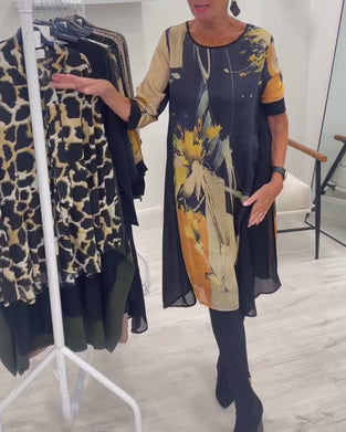 Klänning Med Rund Halsringning Och Retrotryck