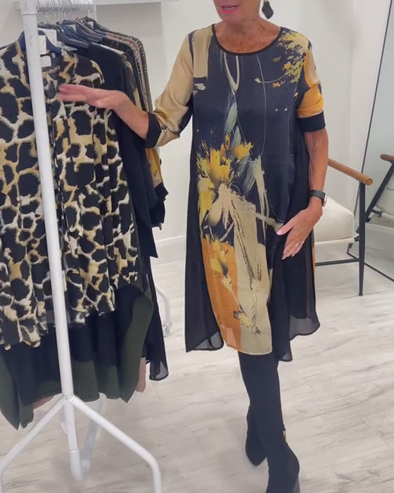 Klänning Med Rund Halsringning Och Retrotryck