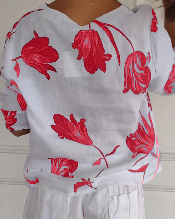 Blommig topp i bomull och linne med knappar