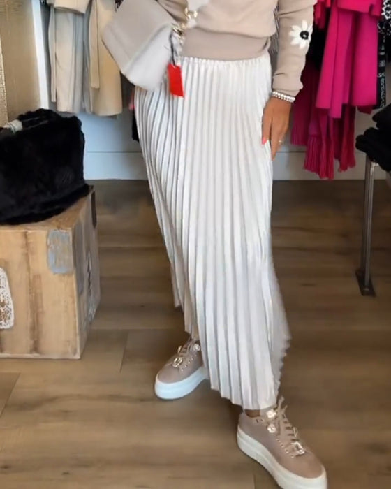 Plisserad enfärgad klänning