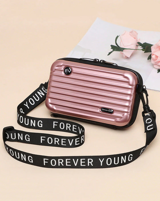 Miniatyrresväska som korsväska