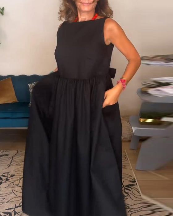 Rygglös Klänning Med Bow