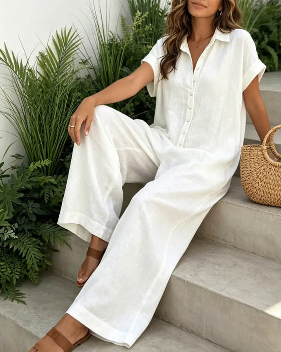 Avslappnad Enfärgad Jumpsuit Med Krage
