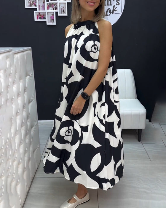 Ärmlös elegant tryckt klänning