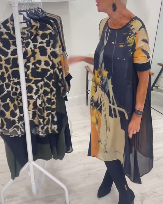 Klänning Med Rund Halsringning Och Retrotryck