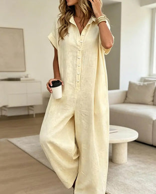 Avslappnad Enfärgad Jumpsuit Med Krage