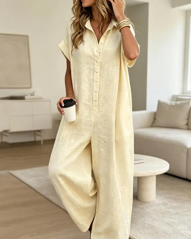 Avslappnad Enfärgad Jumpsuit Med Krage