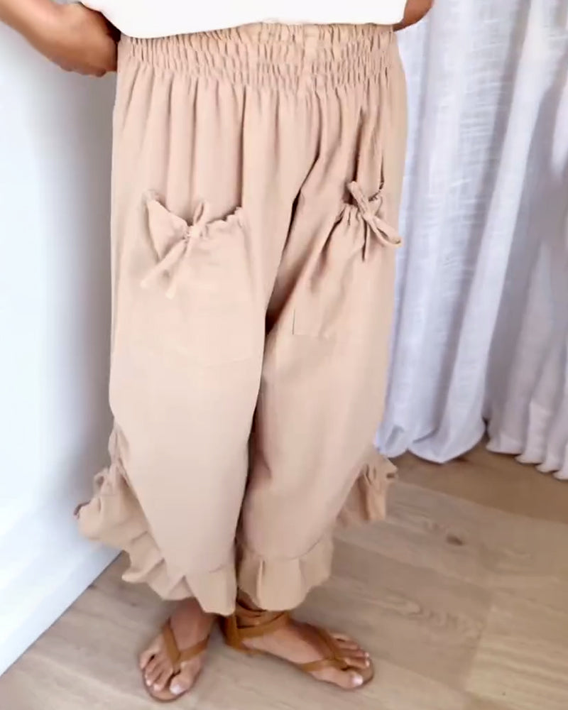 Snygg fickdesign med resår i midjan på byxorna